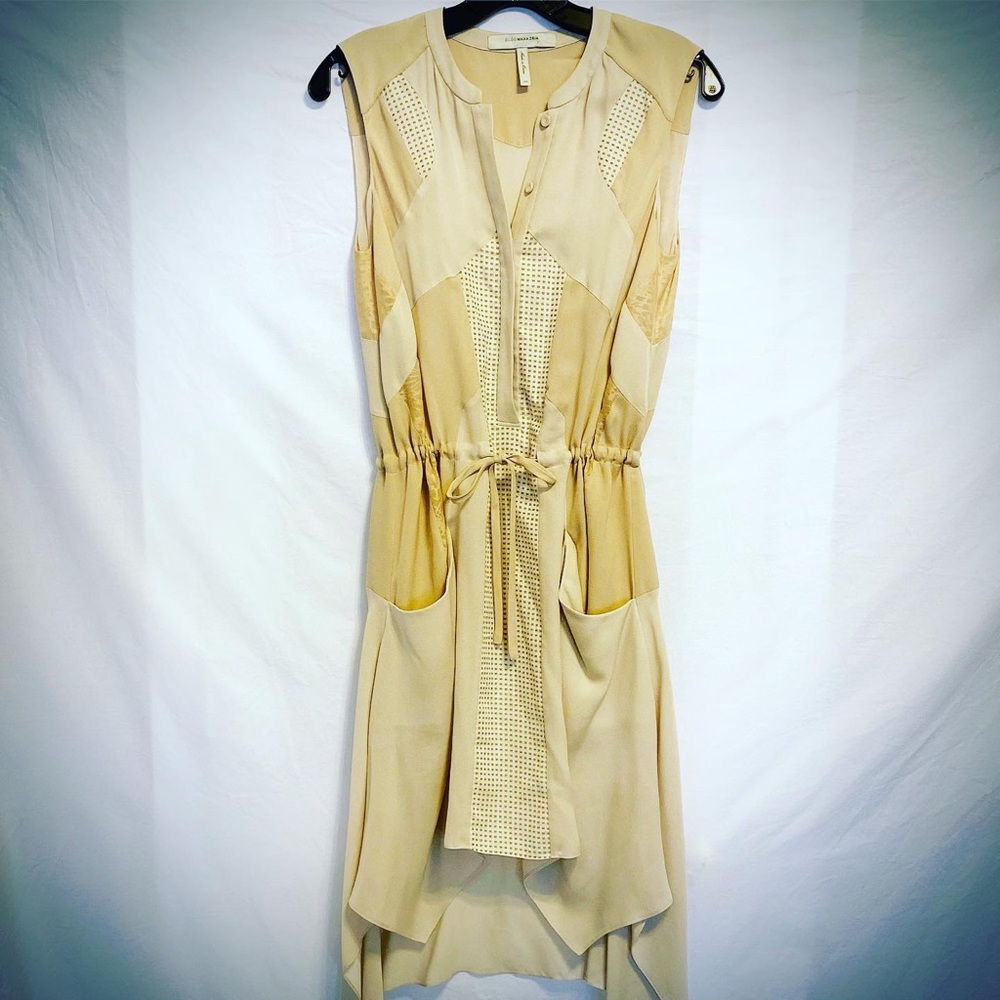 Lightweight BCBG Dress w/ back cutout detail.